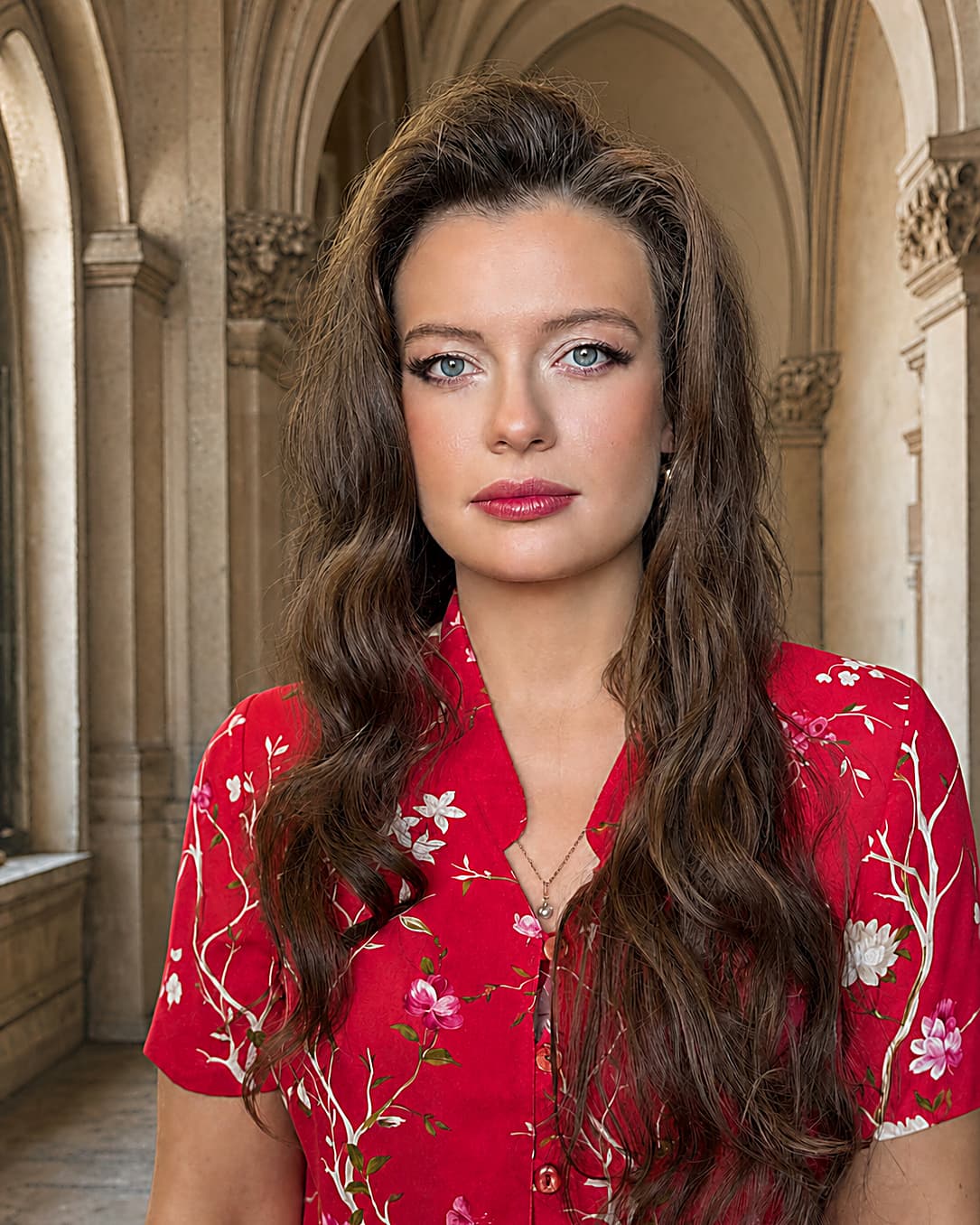 GLORIALLE in a red floral portrait